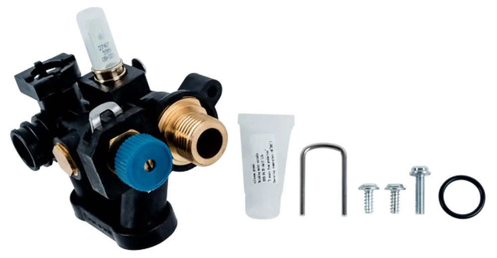 Hydraulikblock von Wolf mit verschiedenen Anschlüssen, Schrauben und Dichtungen. Zubehör besteht aus einer Tube und einem Halter.